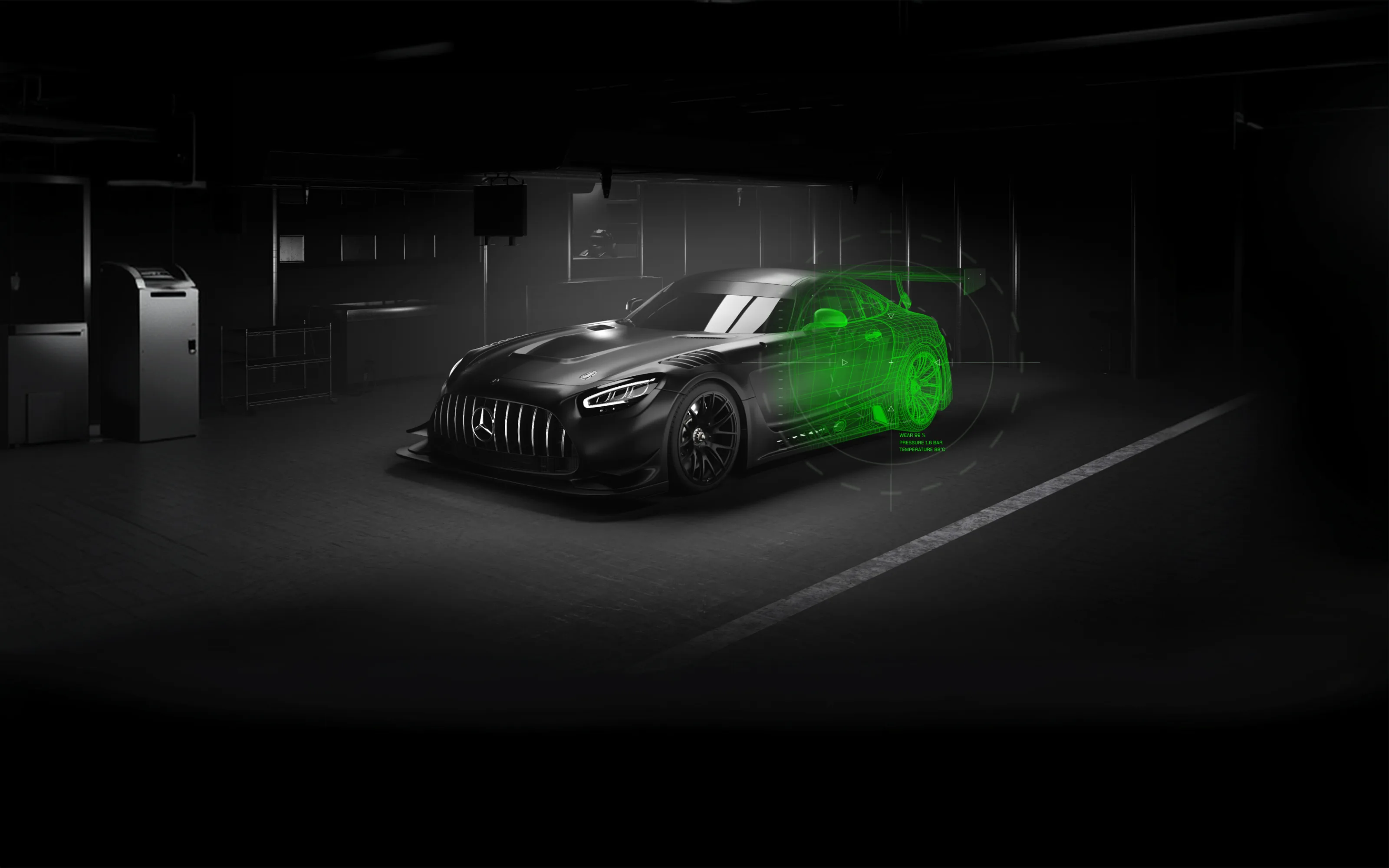 A matte-black Mercedes-AMG GT3 parked deep in a dark race garage, its rear half dissolving into a glowing green wireframe with telemetry readouts for tyre wear, pressure and temperature