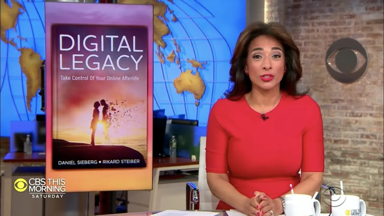 Moderátor pořadu CBS This Morning vedle knihy Digital Legacy od Daniela Sieberga a Rikarda Steibera